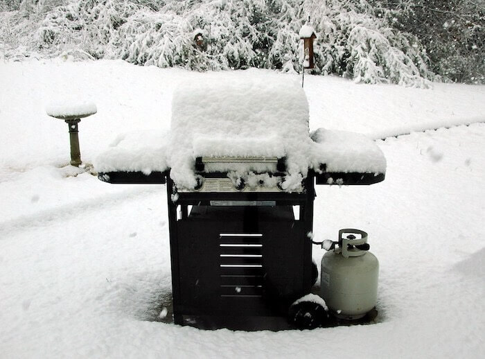 You should refrain from opening the lid of a propane grill
