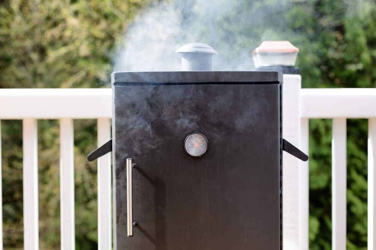 season a new electric smoker before the first use