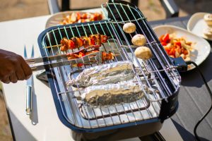 Grilling on a hybrid grill barbecue